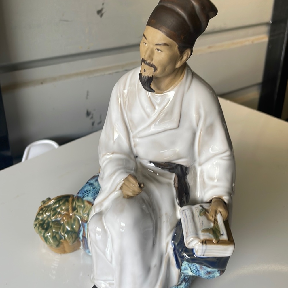 A Chinese Shiwan Pottery Figure